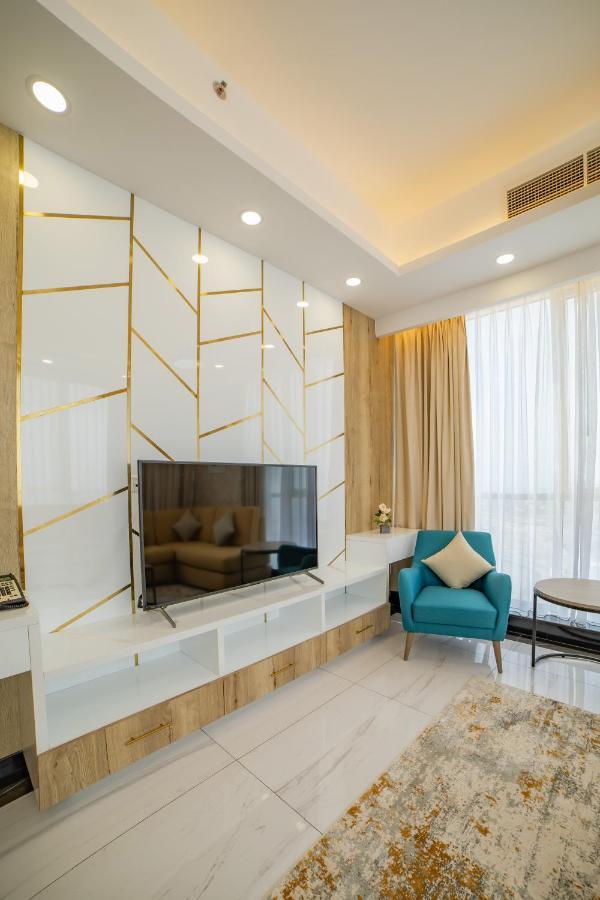 Platinum Coast Hotel Apartments Fujairah Eksteriør billede A television set
