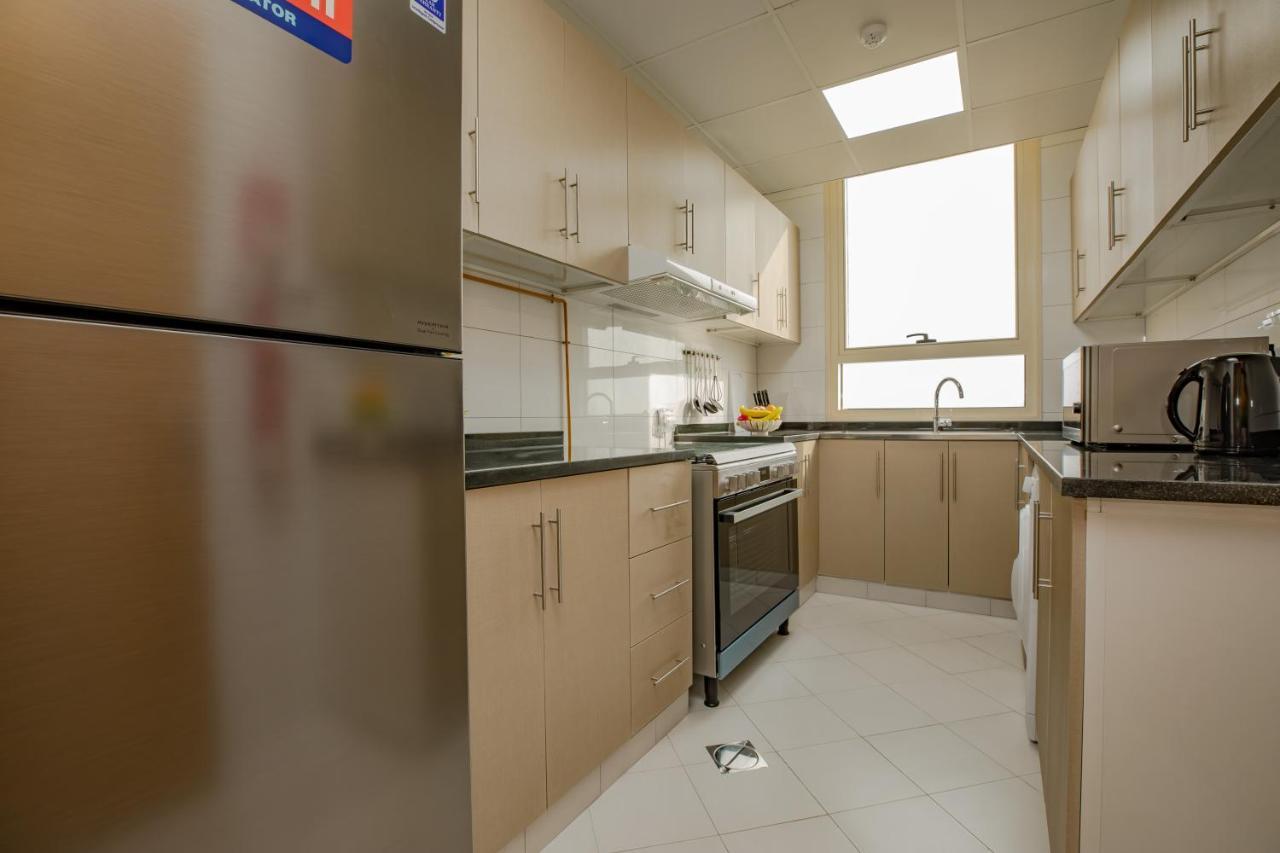 Platinum Coast Hotel Apartments Fujairah Eksteriør billede A typical kitchen