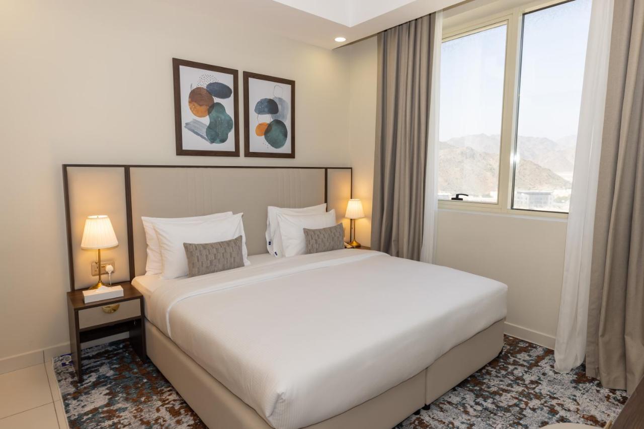 Platinum Coast Hotel Apartments Fujairah Eksteriør billede A bedroom at the hotel